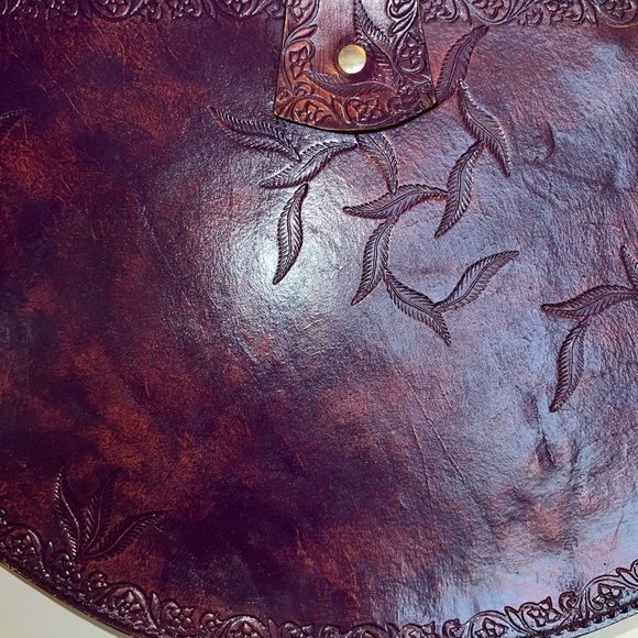 Handmade Leather stamped handbag with circular metal ring handles. - Picture 6 of 11